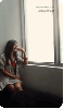 girl looking through the window