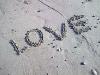 LOVE written on the sand