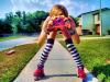 girl with camera on roller blades
